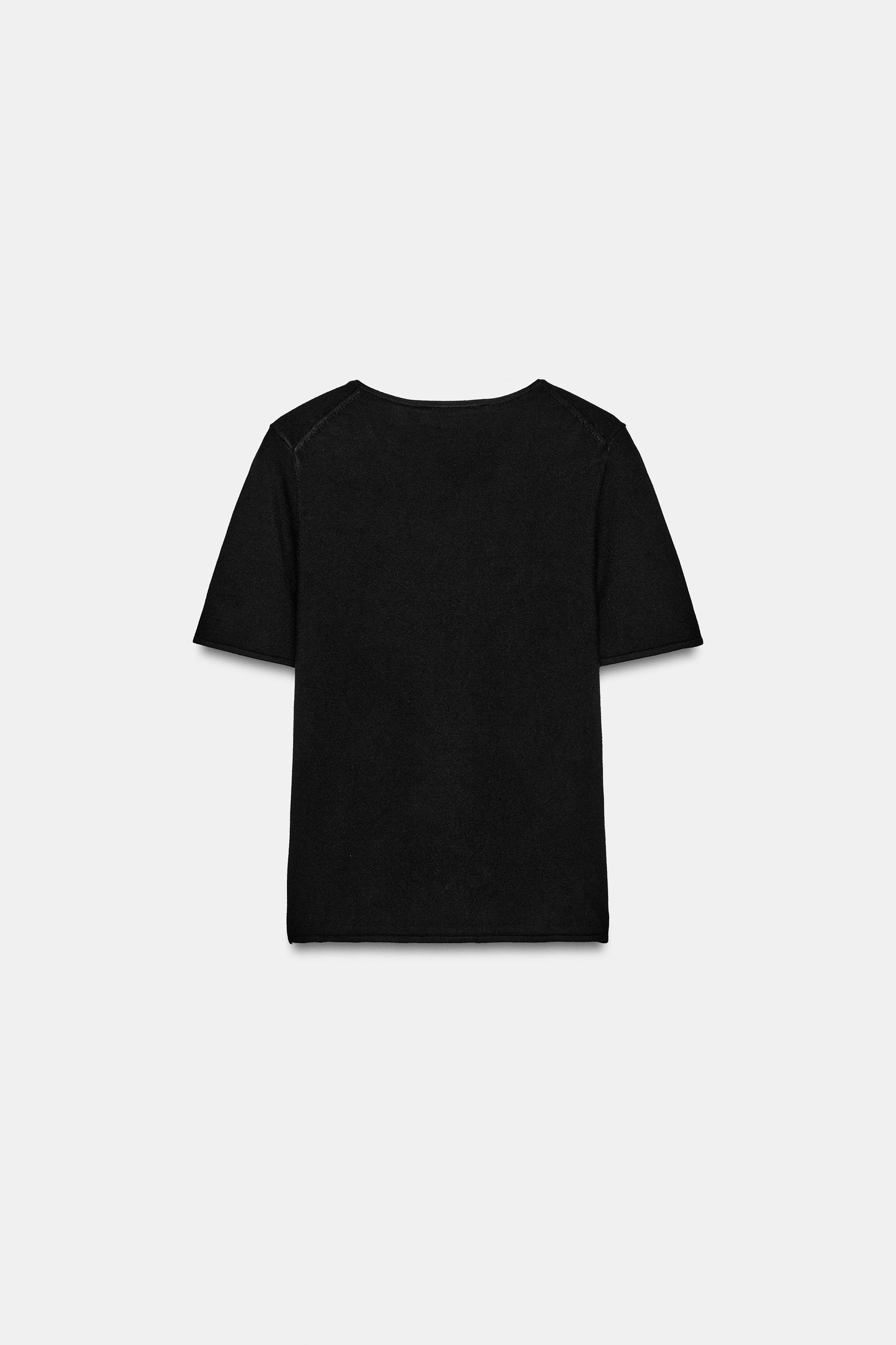 TOP EN MAILLE À MANCHES COURTES
